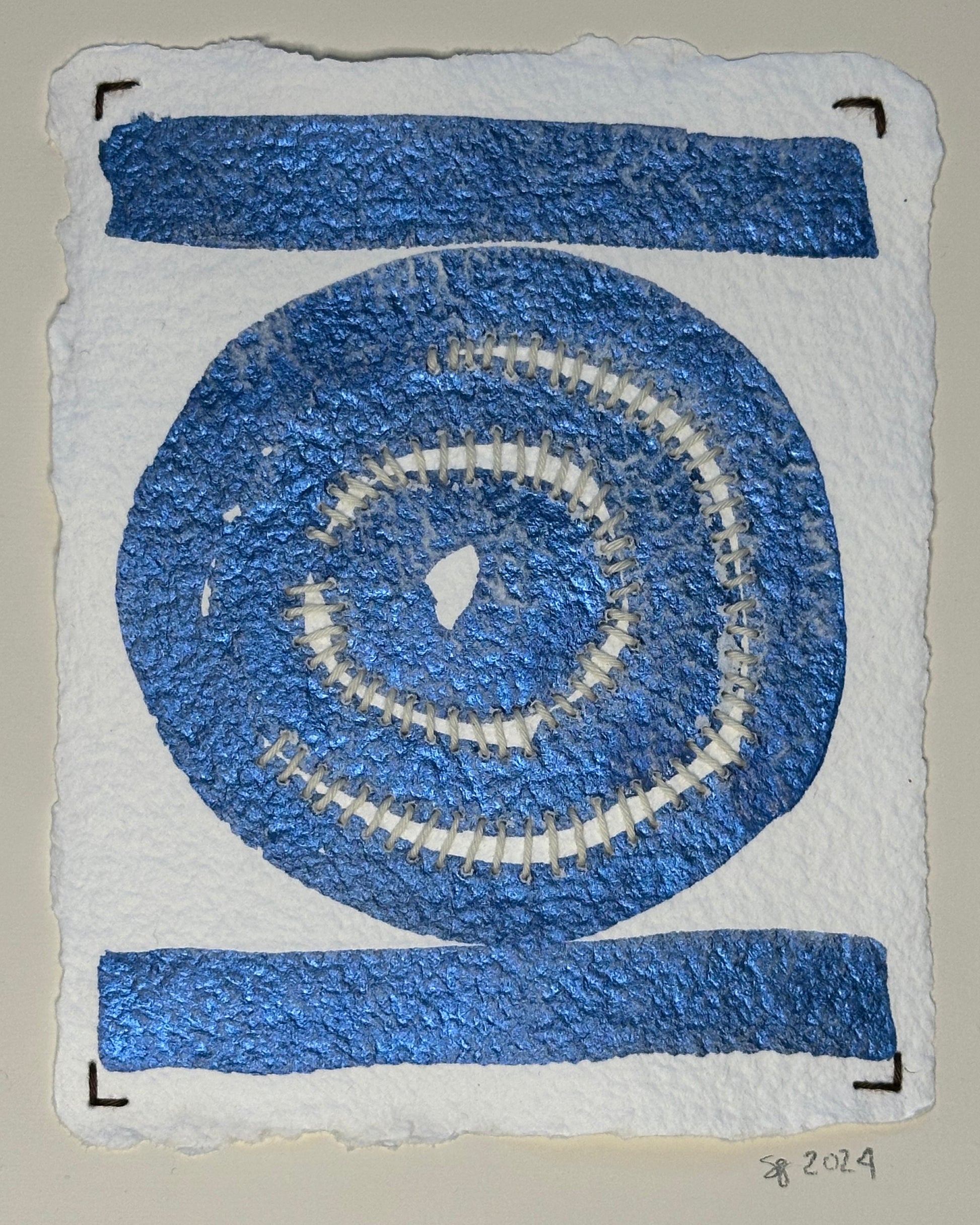 A watercolor painting by Suzanne Gibbs featuring a snail trail pattern with blue and white colors on a white background, signed and dated by the artist on the front.