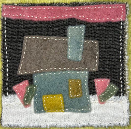 Fragments of Home textile art by Suzanne Gibbs with layered felt shapes in pink, green, yellow, blue, brown, and black, hand-stitched with white thread.