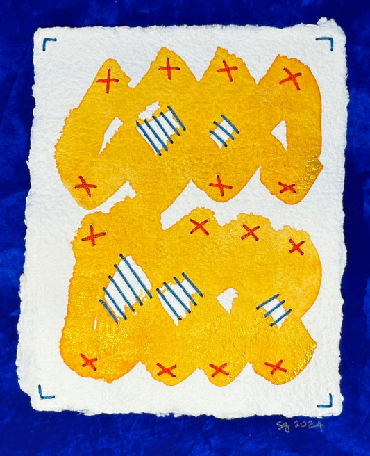 A piece of art with yellow and blue abstract shapes on a white background, signed and dated by Suzanne Gibbs. 