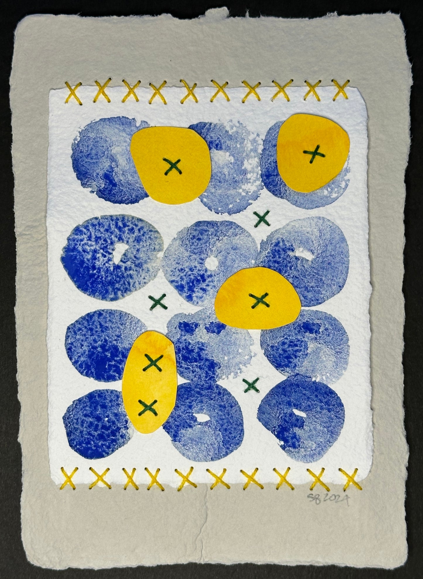 A watercolor painting featuring geometric patterns with blue and yellow colors, and Sashiko thread textures by Suzanne Gibbs.