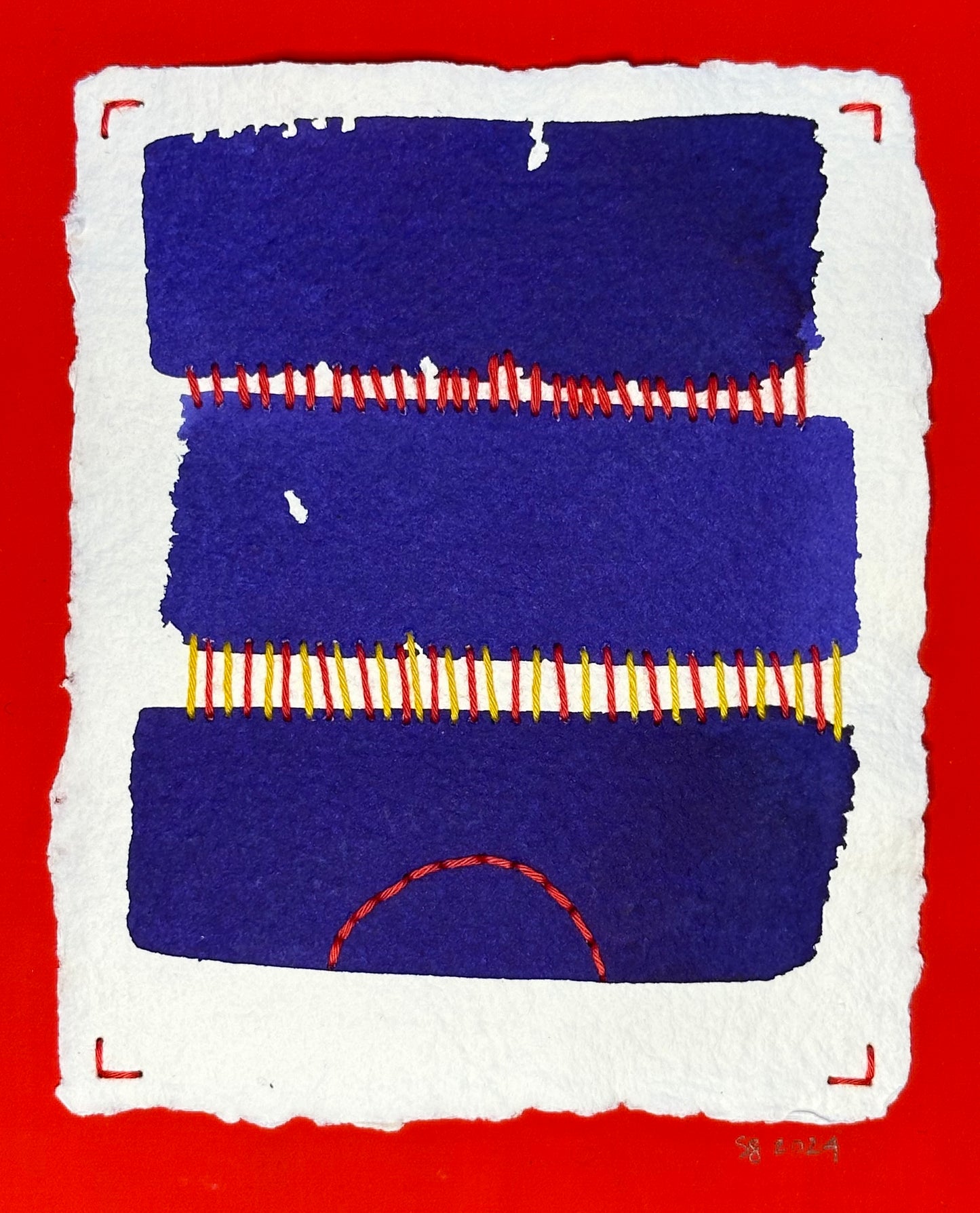 Contemporary abstract art featuring blue and red with sashiko thread stitches on a white background, signed and dated by the artist, Suzanne Gibbs.