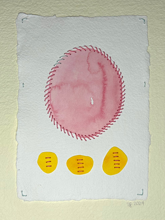 A watercolor painting titled ‘Stitch & So #54 Age Up’ featuring a pink stitched oval and three yellow accent circles, signed and dated by the artist, Suzanne Gibbs on the front.