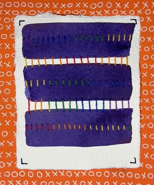Art made by Suzanne Gibbs of Portland, OR, featuring three purple rectangles of paint with stitched lines in various colors creating a pattern, placed on an orange surface with X’s and O's at the edges.