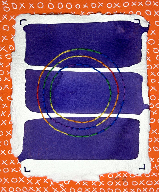 Art created by Suzanne Gibbs of Portland, OR, featuring stitched circles in rainbow colors on a background of three purple, painted rectangular sections over an orange pattern of X's and O's.