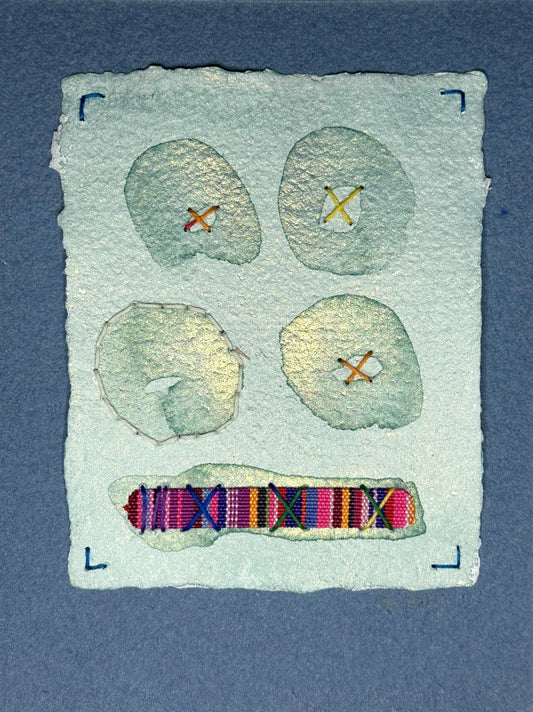 A watercolor and sashiko thread painting on handcrafted paper by Suzanne Gibbs, featuring a collage with Peruvian-inspired elements, signed and dated by the artist.