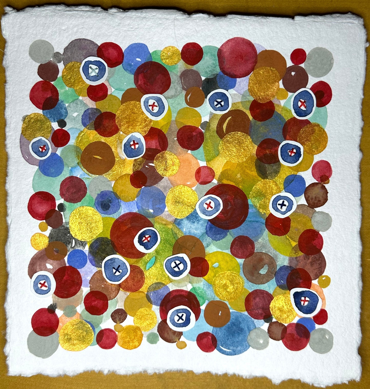 A stitch painting by Suzanne Gibbs featuring overlaid dots and X’s in various colors on a white background.