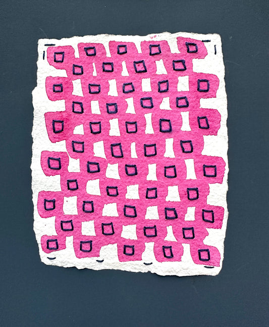 Mixed media artwork by Suzanne Gibbs from her Stitch & So series, created with watercolor paint and thread on handmade paper, featuring a grid of pink square forms with navy stitched lines suggesting boxes on a white background.
