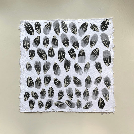 A collage painting featuring a regular pattern of black petal shapes on a white background, executed with watercolor and thread by Suzanne Gibbs.