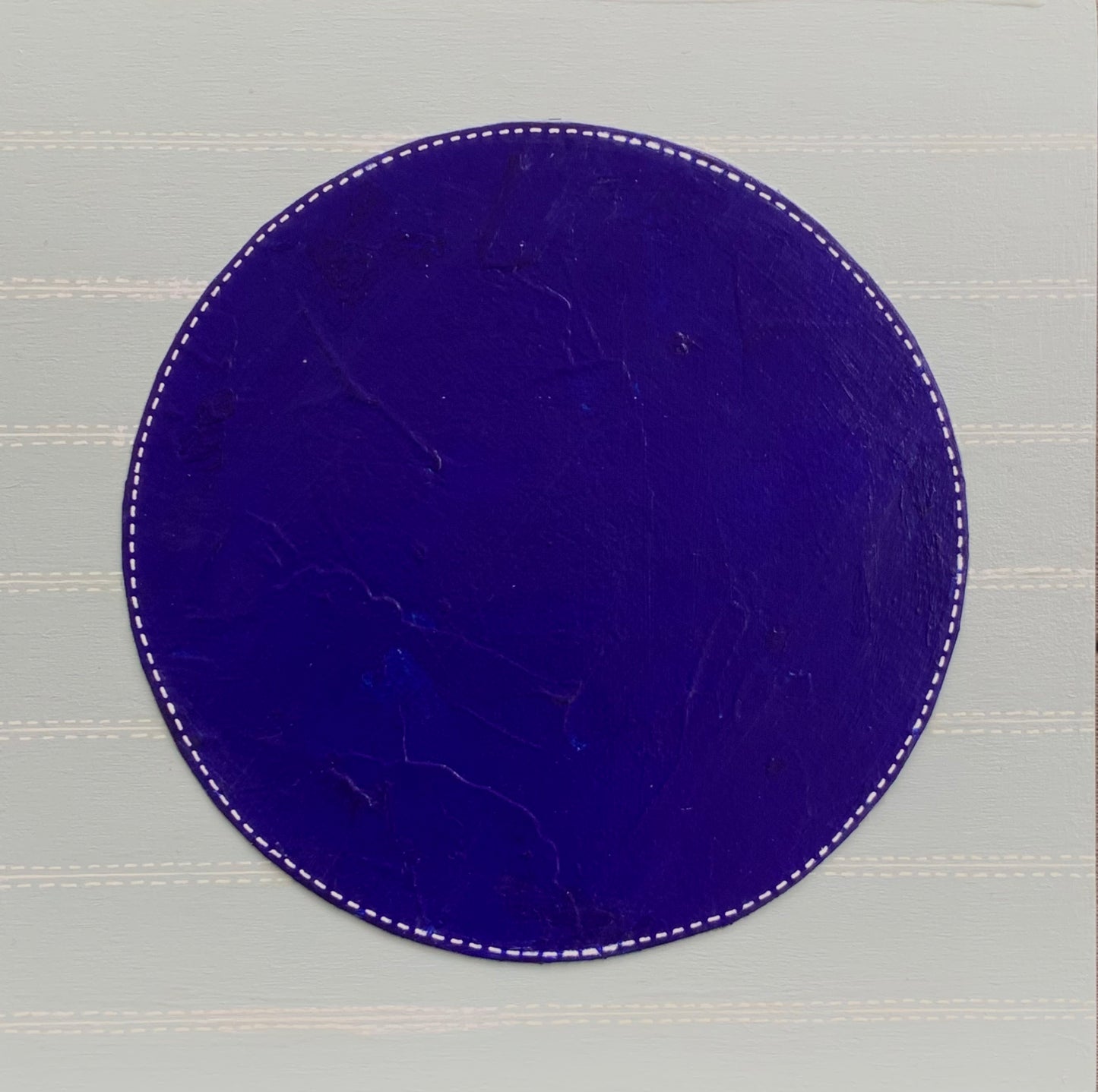 An abstract painting using Flashe paing by Suzanne Gibbs featuring a royal blue dots over a pale blue background and detailed hand-drawn stitch marks.