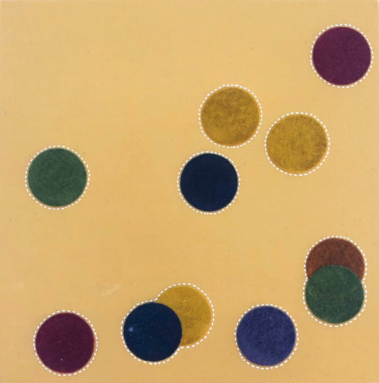 An abstract dot painting made by Suzanne Gibbs featuring a yellow background with felt dots in various colors including blue, green, and purple, on a cradled wood panel.